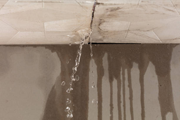 Professional Flood Damage Cleanup technician working in Jay, ME
